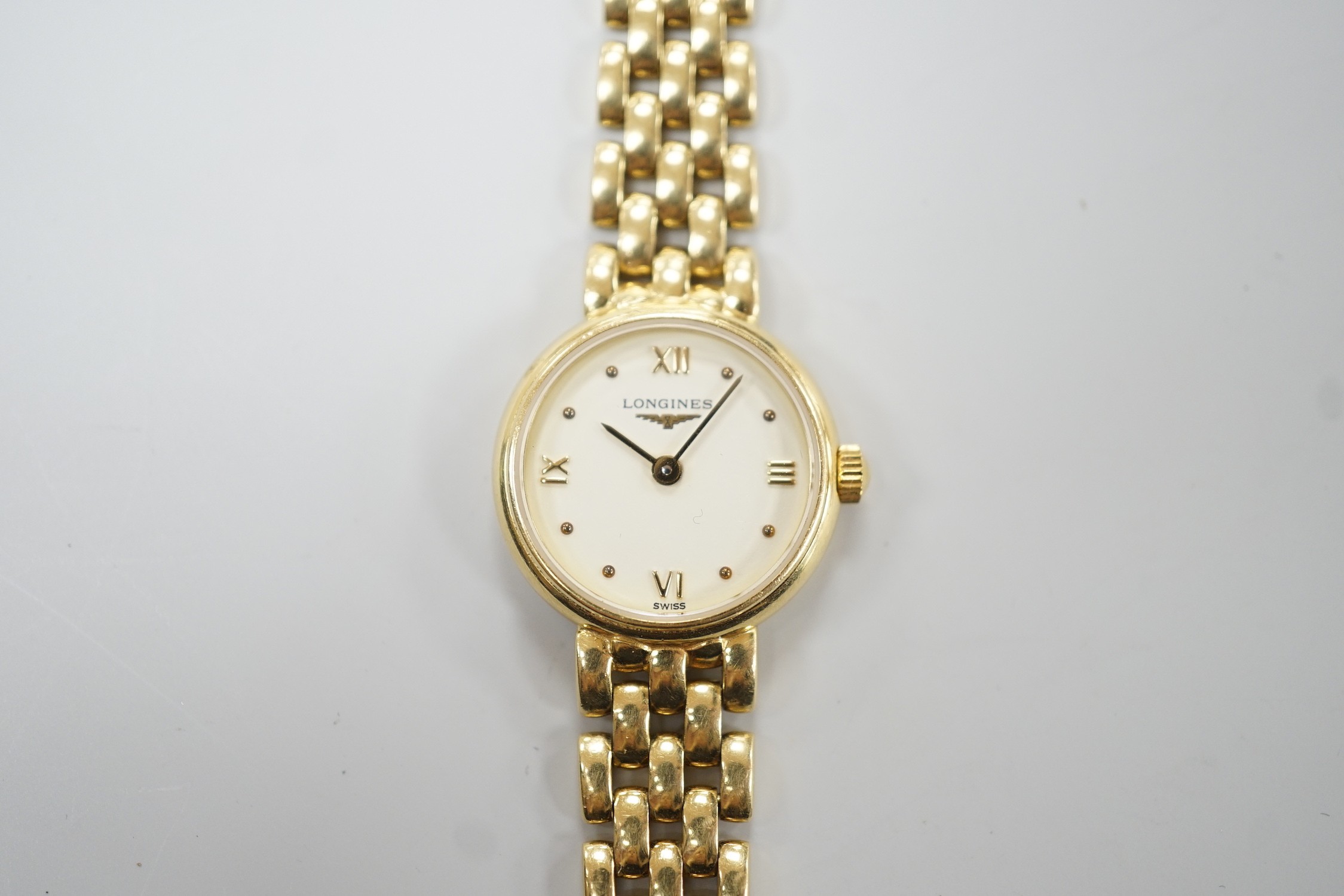 A lady's 2001 18ct gold Longines quartz wrist watch, on an 18ct gold Longines bracelet, overall length 18cm, gross weight 29.2 grams, with box and papers.